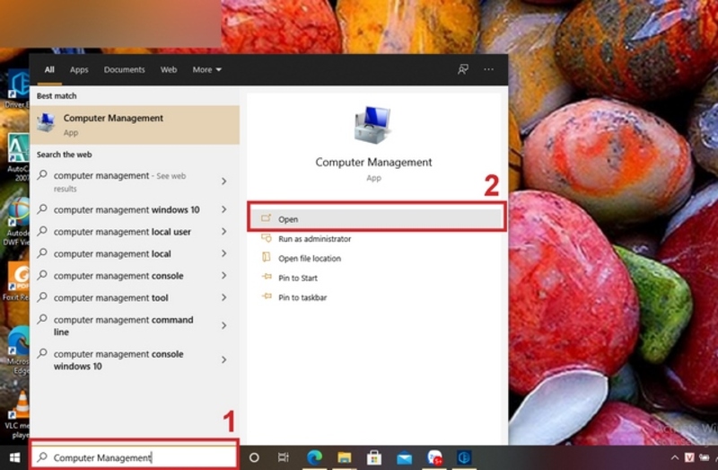 Tìm kiếm "Computer Management" trong menu Start và chọn "Open" để mở